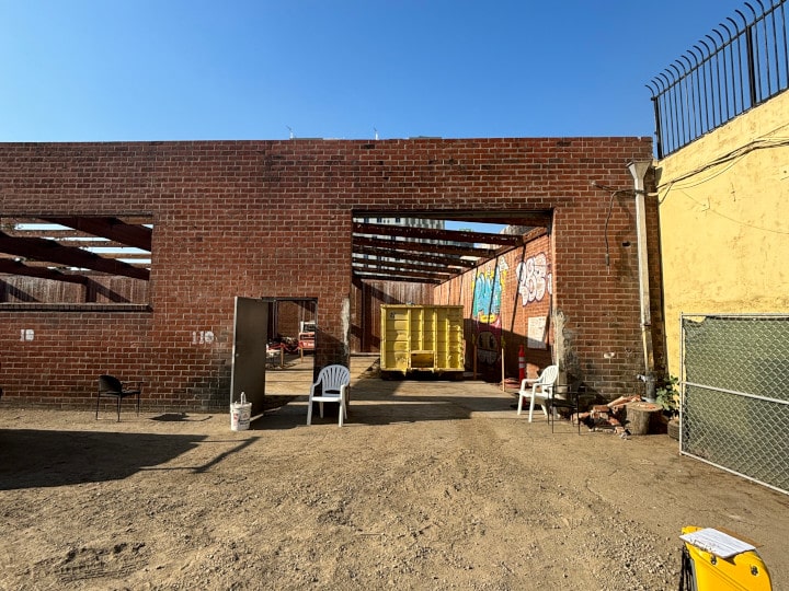wall sawing large opening in brick wall - outside view