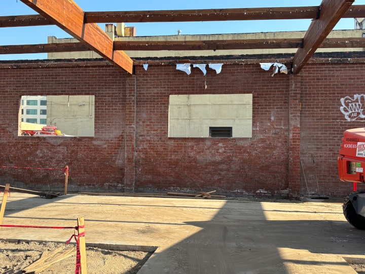 wall sawing new windows in brick wall - outside view