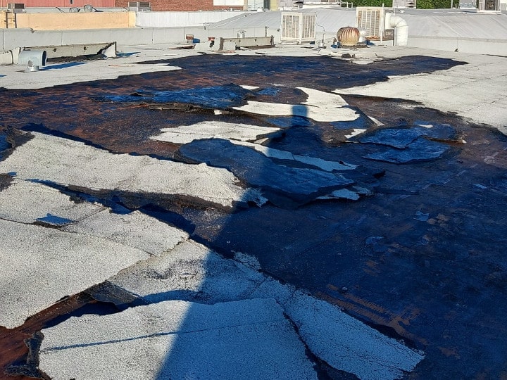 removing concrete slabs from rooftop