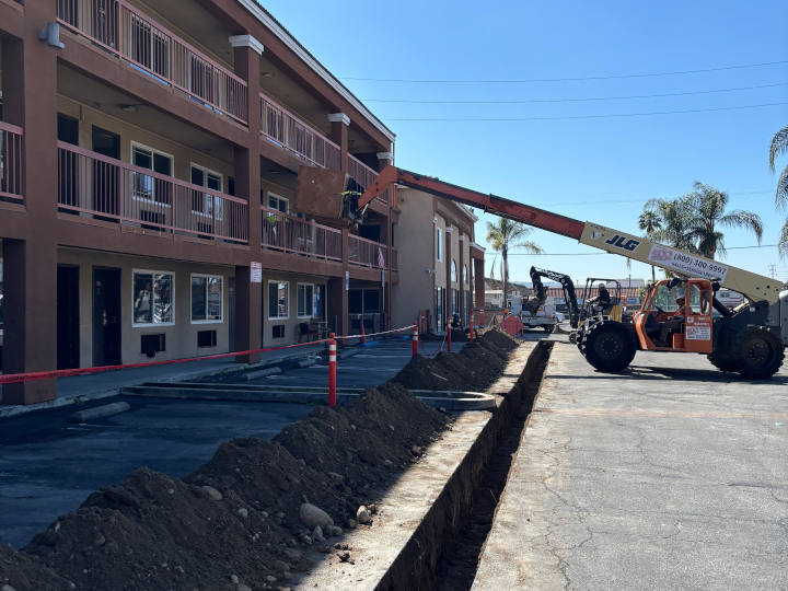 demolition excavator on job site
