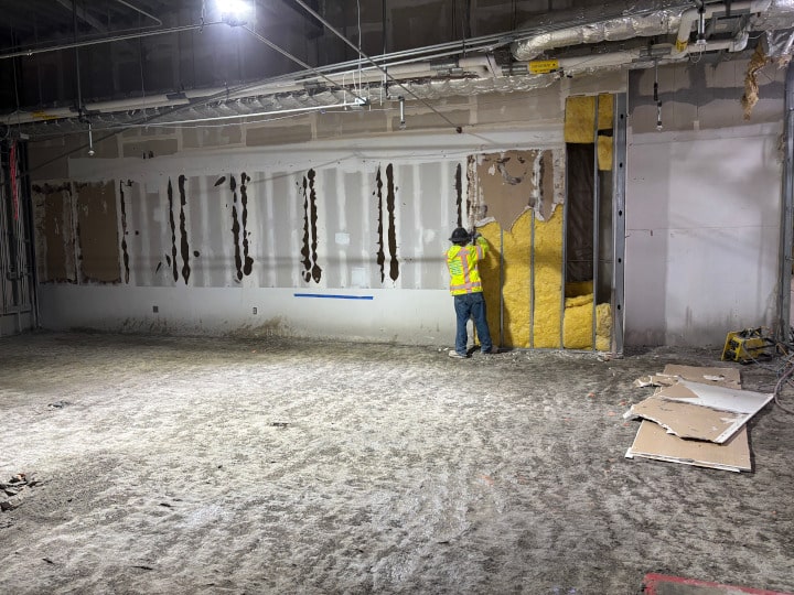 removing wall insulation during selection demolition phase