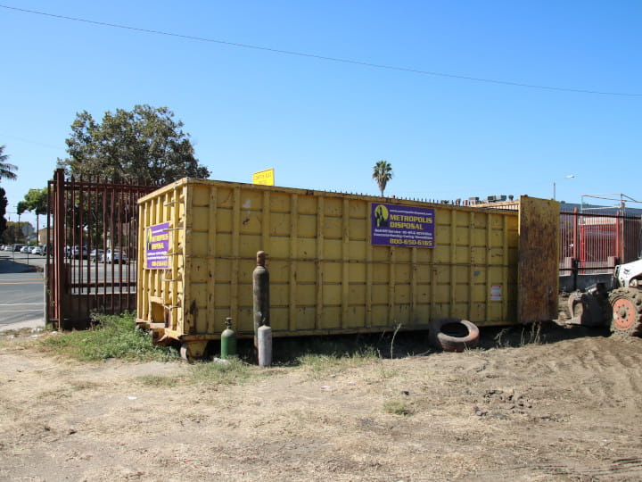 Metroplish Disposal dumpster bin rental on job site